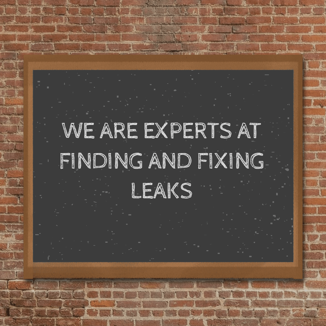 chalk board with "we are experts at finding and fixing water leaks"